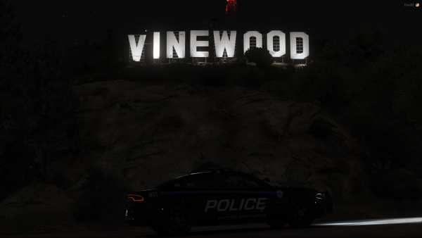 Vinewood Charger by the iconic Vinewood sign