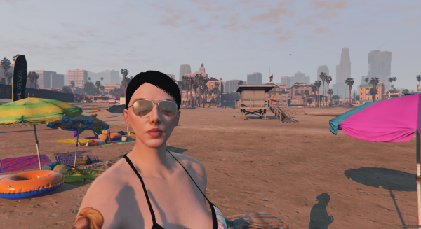 Paige selfie on beach.png